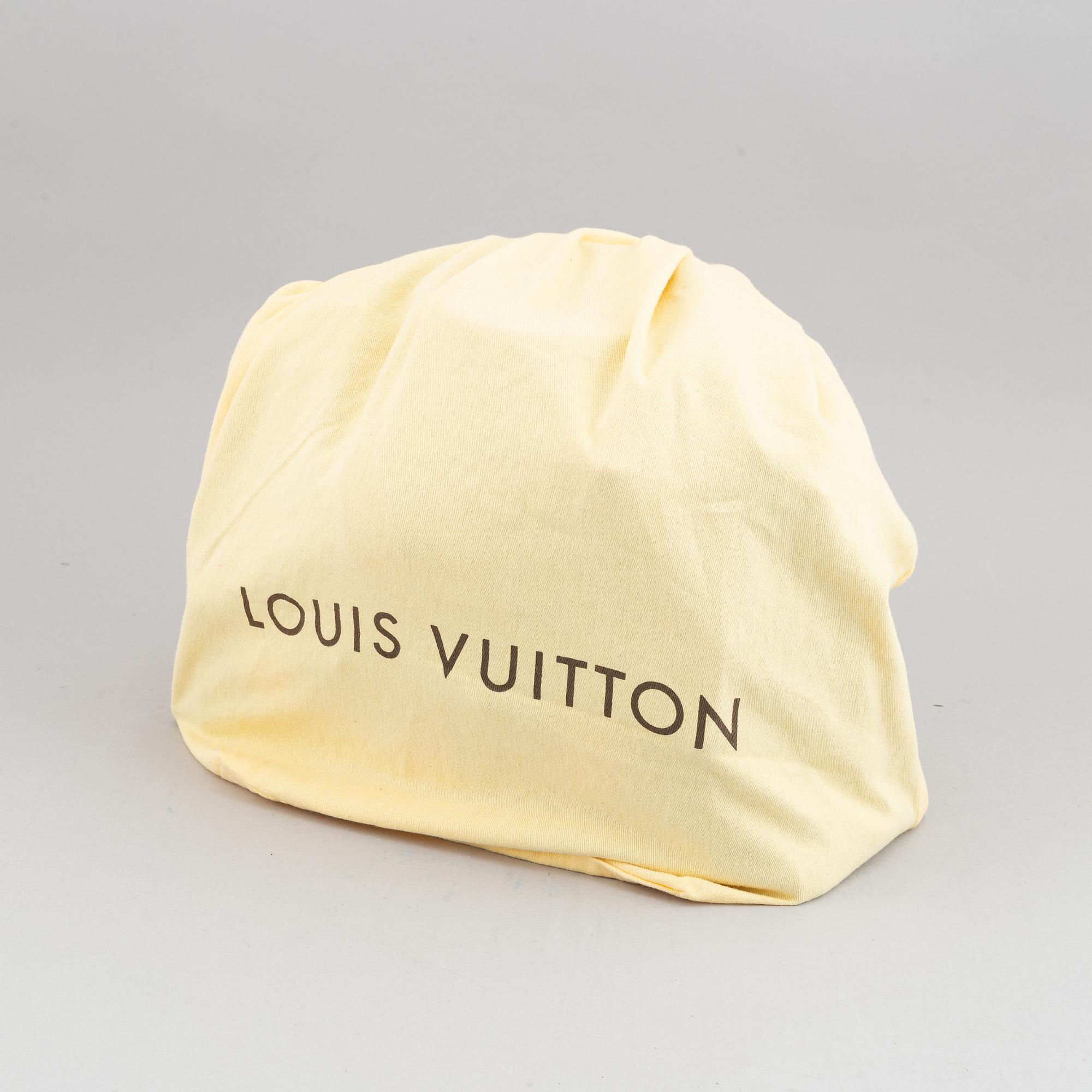 Louis Vuitton, a monogram canvas handbag.