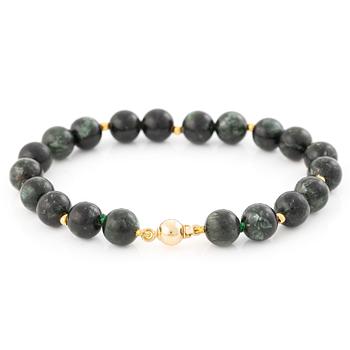 Bracelet, with dark green stones, clasp in 18K gold.