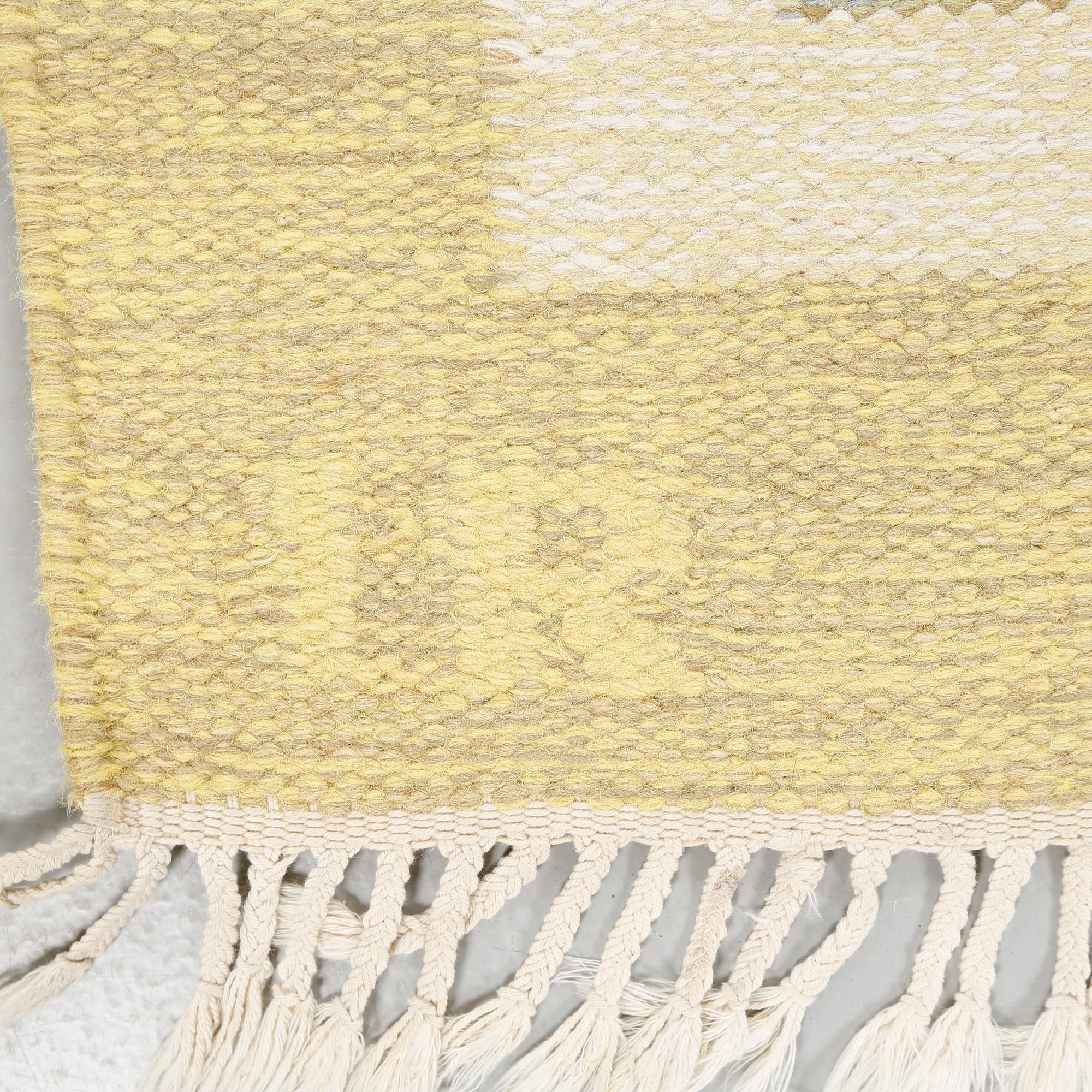 A flat weave by Ida Rydelius, signed IR, second half of the 20th century, 235 x 169 cm.