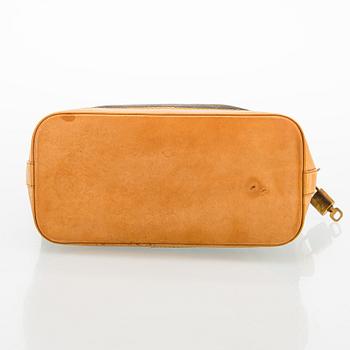 Louis Vuitton, a 'Lockit PM' bag.