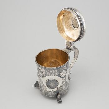 A parcel-gilt silver baroque style tankard.