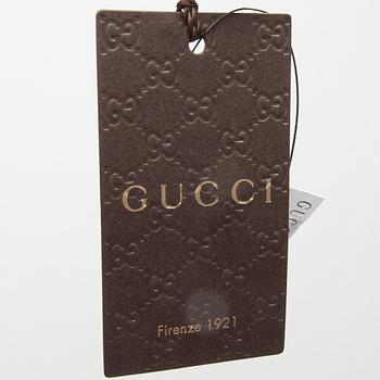 TOPP, Gucci.
