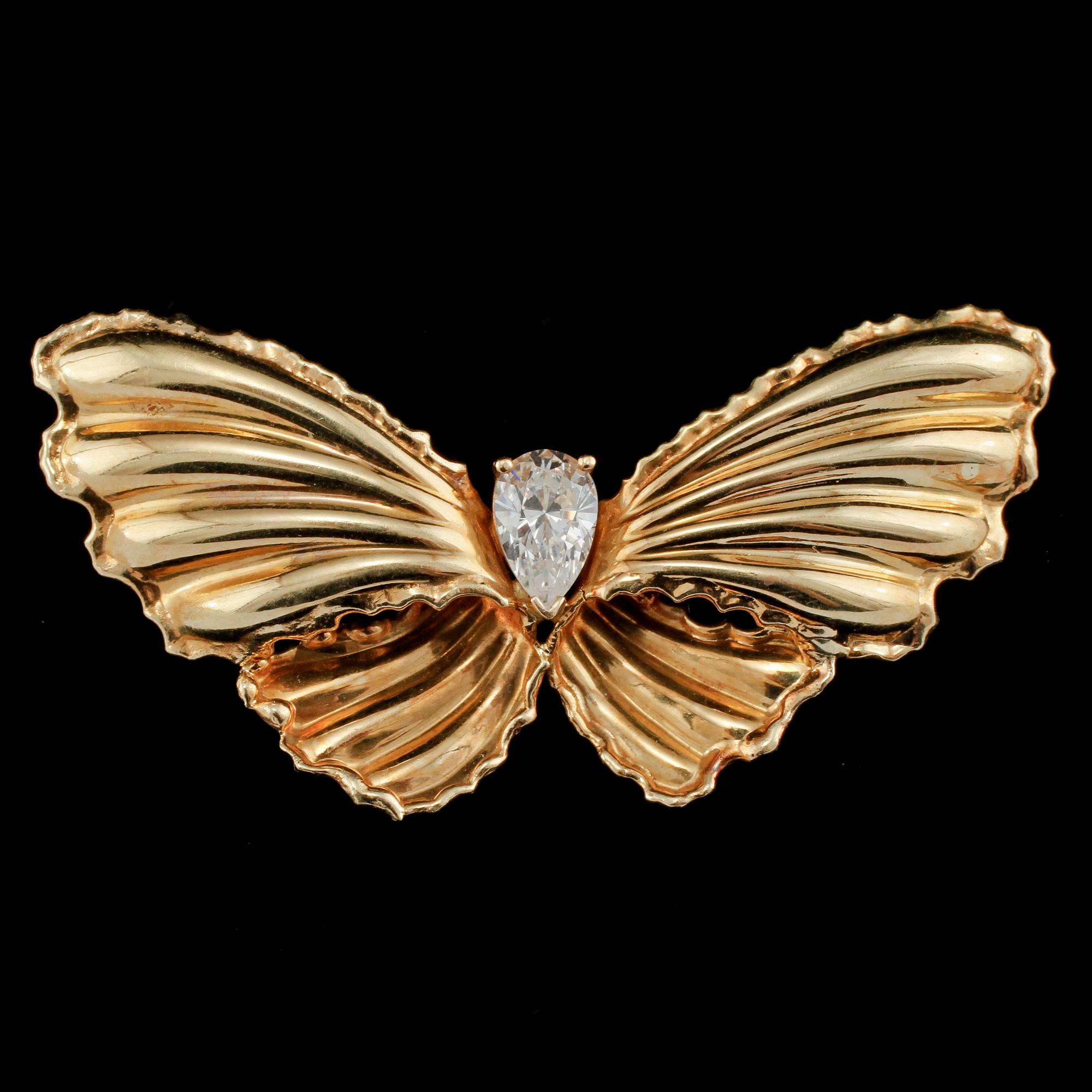 BROSCH, 18k guld med fasettslipat glas, importstämplad, 1900-talets tredje kvartal. Vikt 5 g.