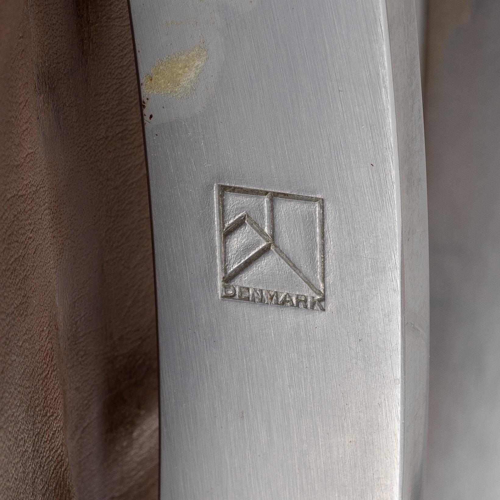 Poul Kjaerholm, a pair of brown leather "PK-22" chairs, edition E Kold Christensen.