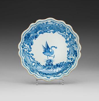 496. A blue and white armorial dish, Qing dynasty, Qianlong (1723-35).