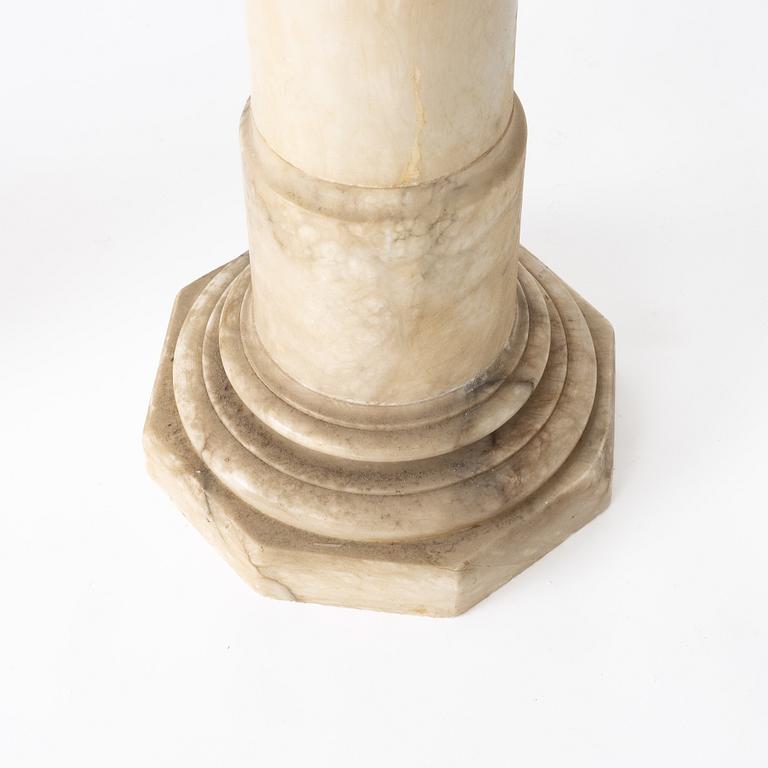 A table lamp on a pedestal, early 20th Century.