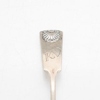 Silver spoons, 29 pcs, and sugar tongs with shell motif mostly by Kuopion Kultaseppä oy, Kuopio, 1919-53.