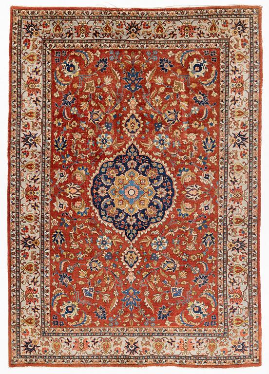 A oriental carpet, ca 320 x 223 cm.
