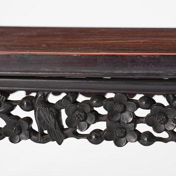 A Chinese hardwood kang table, late Qing dynasty.