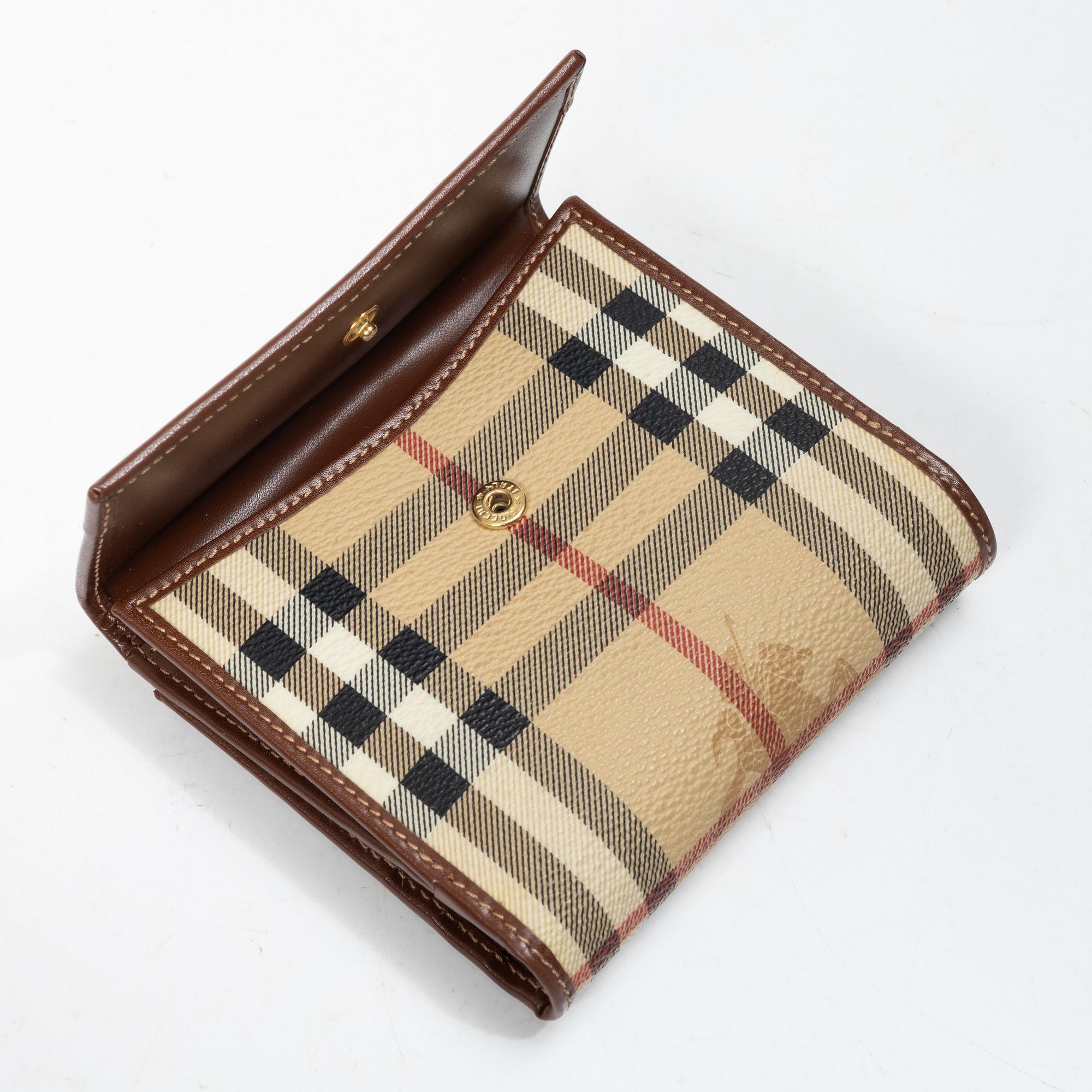 Burberry, väska samt plånbok.