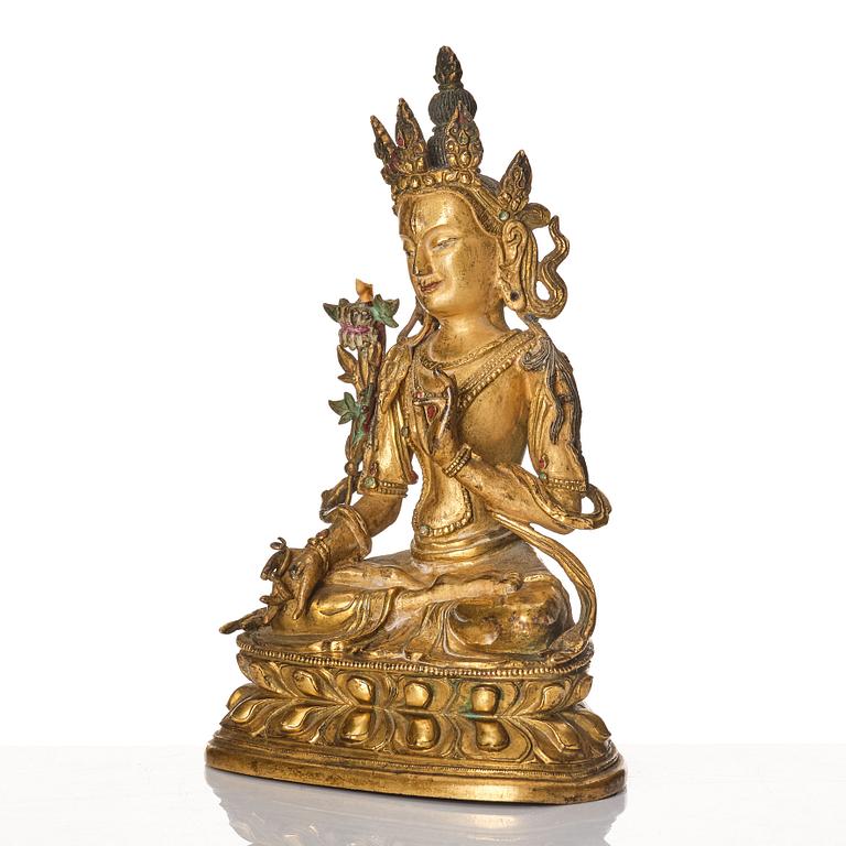 A Tibeto-Chinese/Mongolian gilt bronze figure of White Tara, 18th Century.