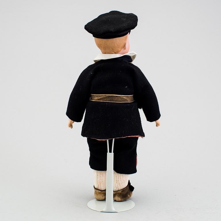 A bisque headed character doll 500 by Armand Marseille, Germany, ca 1910.