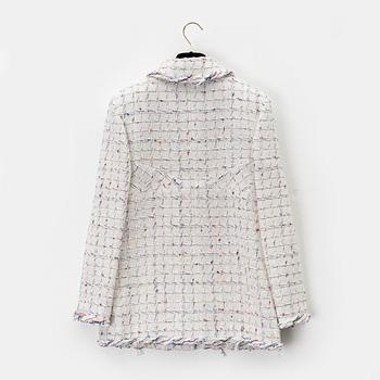 Chanel, a white bouclé jacket, size 34.