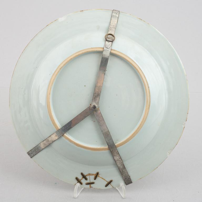 A pair of famille rose double peacock dishes, Qing dynasty, 18th century.