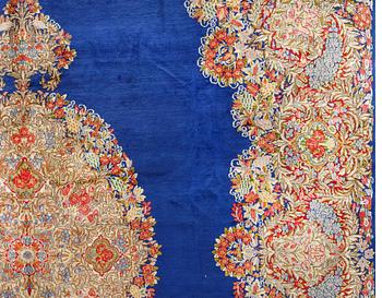 A Kirman carpet, Southeastern Iran, c. 392 x 300.