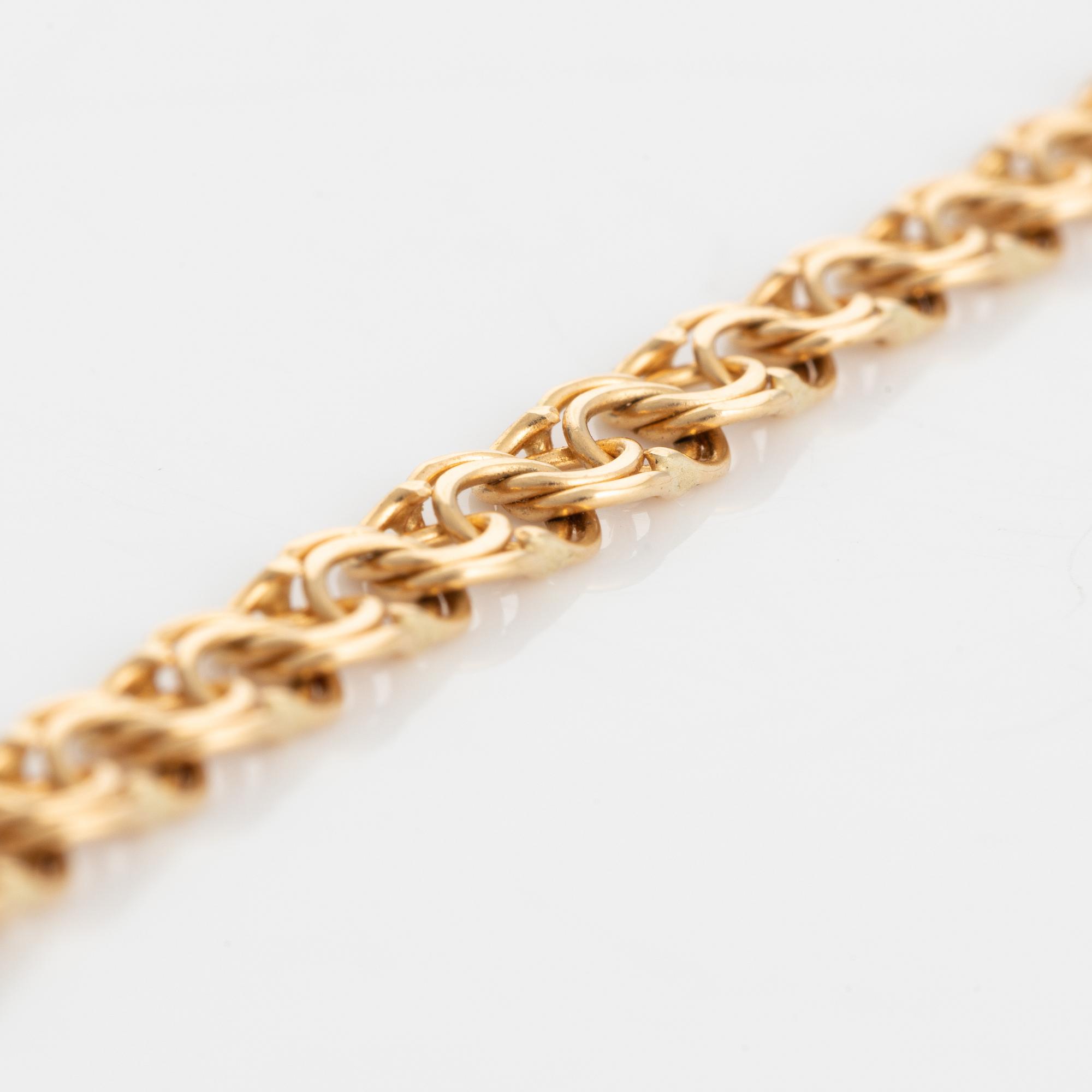 18K gold necklace.