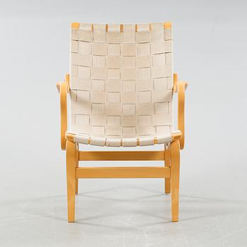 A easy chair by Bruno Mathsson, "Eva", Dux from the latter half of the 20th century.