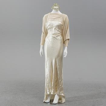 A satin wedding dress, circa 1935.