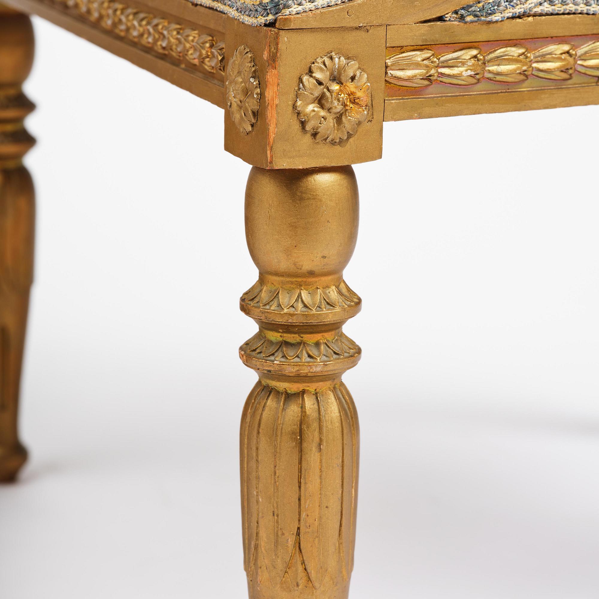 A pair of late Gustavian open armchairs attributed to E. Ståhl (master in Stockholm 1794-1820).