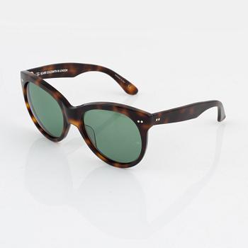 Oliver Goldsmith,a pair of tortoise "Manhattan" sunglasses.