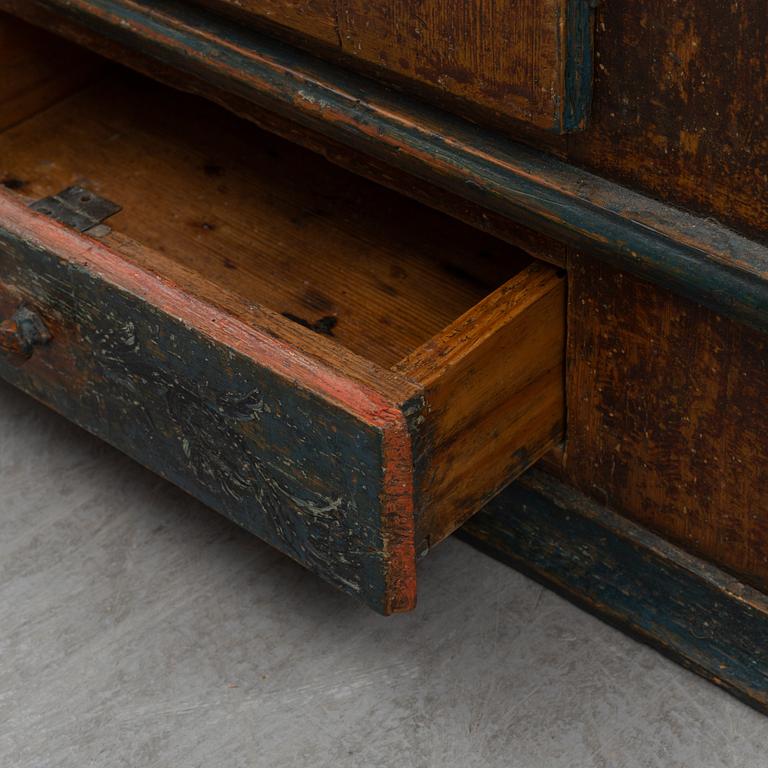 A 18/19th century  pine wall cabinet.