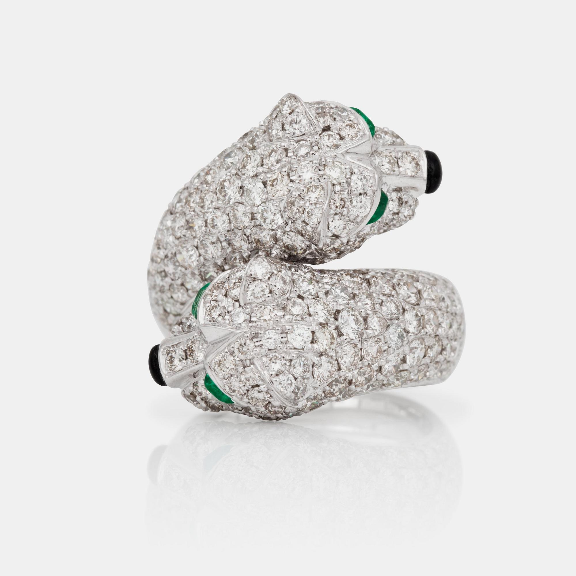 A brilliant-cut diamond, 3.36 cts, agate and emeralds, 0.15 ct, ring.