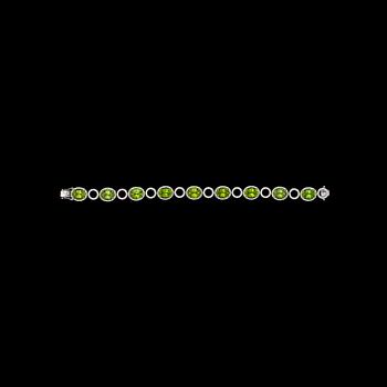 1122. A peridote, tot. 25.63 cts, and brilliant cut diamond bracelet, tot. 2.45 cts.