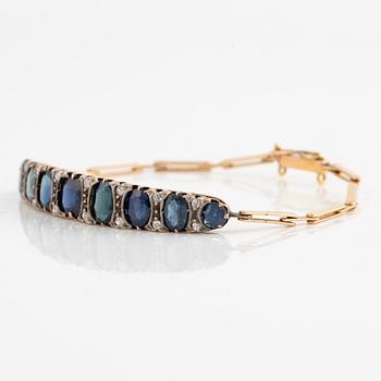 Bracelet 14K gold with dark sapphires and old-cut diamonds.