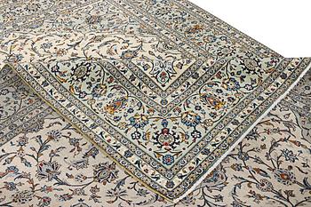 A Kashan carpet, c. 400 x 290 cm.