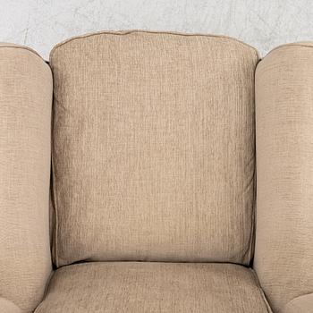 An armchair with footstool, Howard model, Englessons, 21st century.