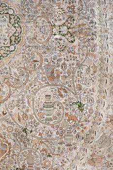 An oval pictoral silk carpet, ca 273 x 180 cm.