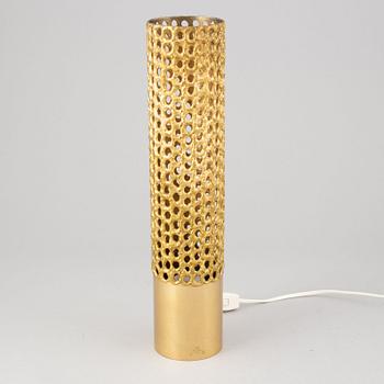 A brass table lamp by Pierre Forssell, second half of the 20th Century.