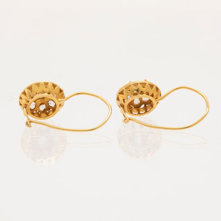 Earrings 21.6K gold with diamonds.