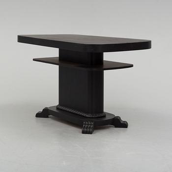 a coffee table from the first half of the 20th century.