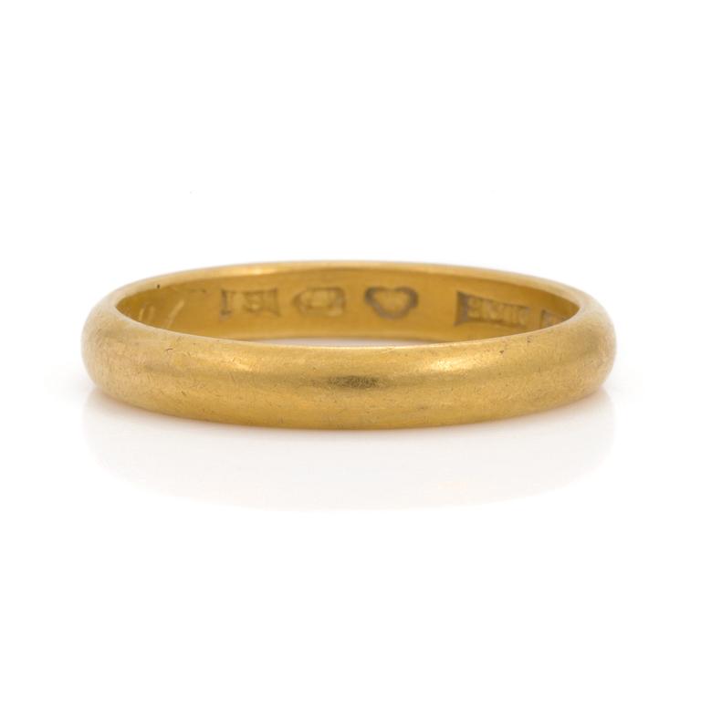 A 23K gold ring.