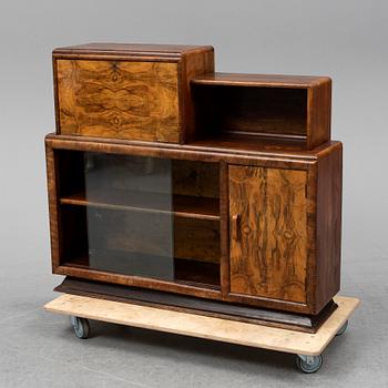 A walnut veneered cabinet, 1930's.