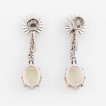 Opal and round brilliant cut diamond earrings.