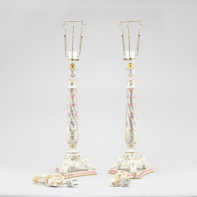 A pair of porcelain lamp feet by Dresden, made in the first half of the 20th century.