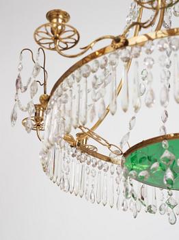 A German Louis XVI ormolu and cut-glass nine-light chandelier attributed to Johann Christoph Ermisch, late 18th century.