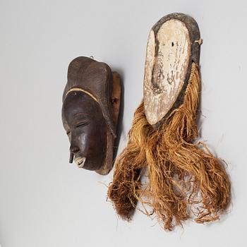 Two 20th century African wooden masks.