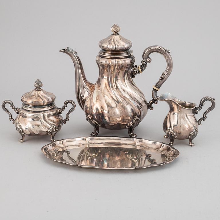 A silver coffee pot, creamer, sugar bowl and tray, swedish import mark.