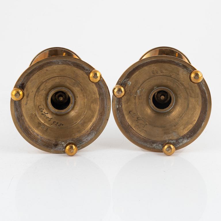 A pair of Skultuna brass and wood candlesticks, first part of the 20th century.