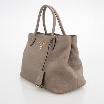 Prada, a clay gray leather handbag, 2020.