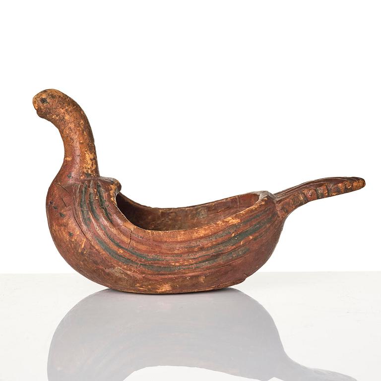 A Swedish carved and painted figural drinking vessel from Jämtland or Härjedalen, late 18th / early 19th century.