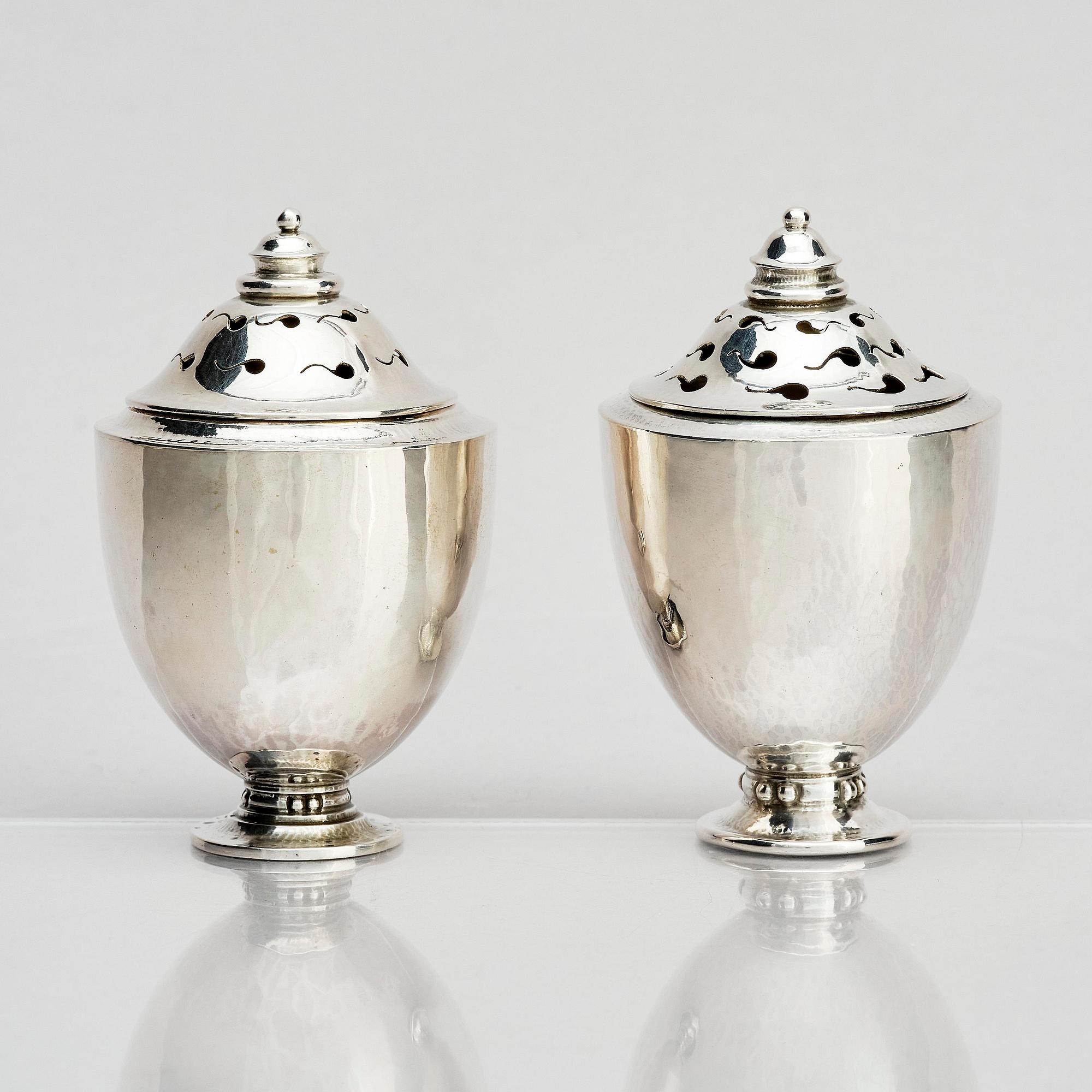 Georg Jensen, a pair of silver casters, design Johan Rohde, Copenhagen 1915-1921.
