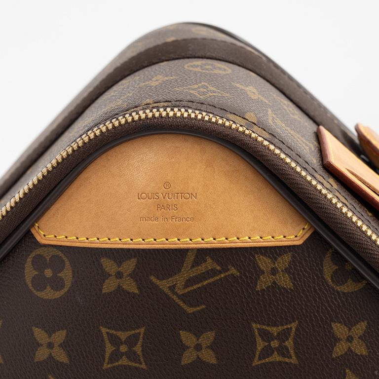 Louis Vuitton, a monogram canvas 'Pégase 65' suitcase.