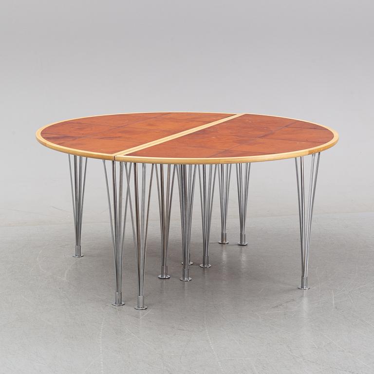 A birch and leather dining table in two parts, Mathsson International, 21th century.