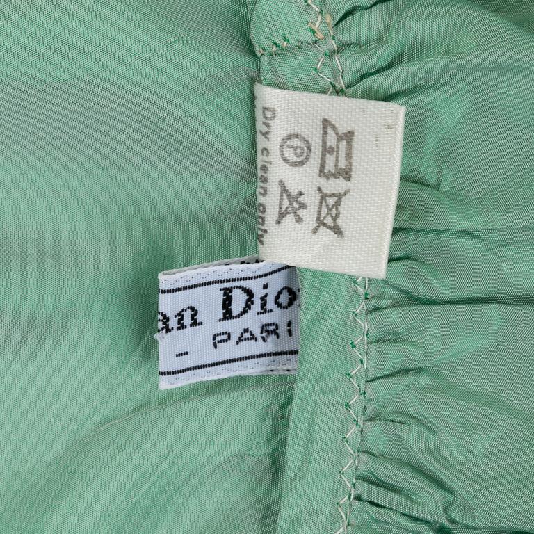 CHRISTIAN DIOR, a green silk shawl/cape.