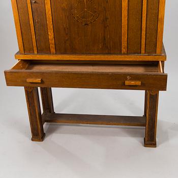 A 1920's oak cabinet.