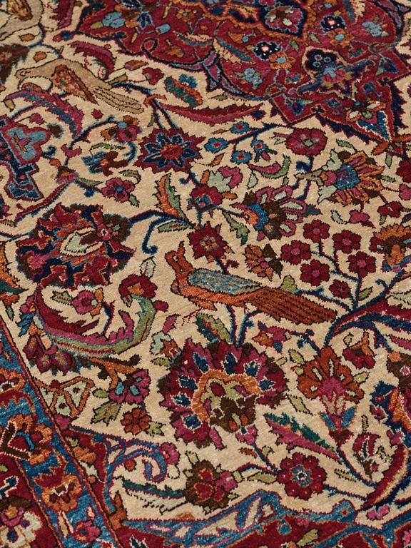 A CARPET, a semi-antique silk Kashan, ca 208,5 x 130 cm.